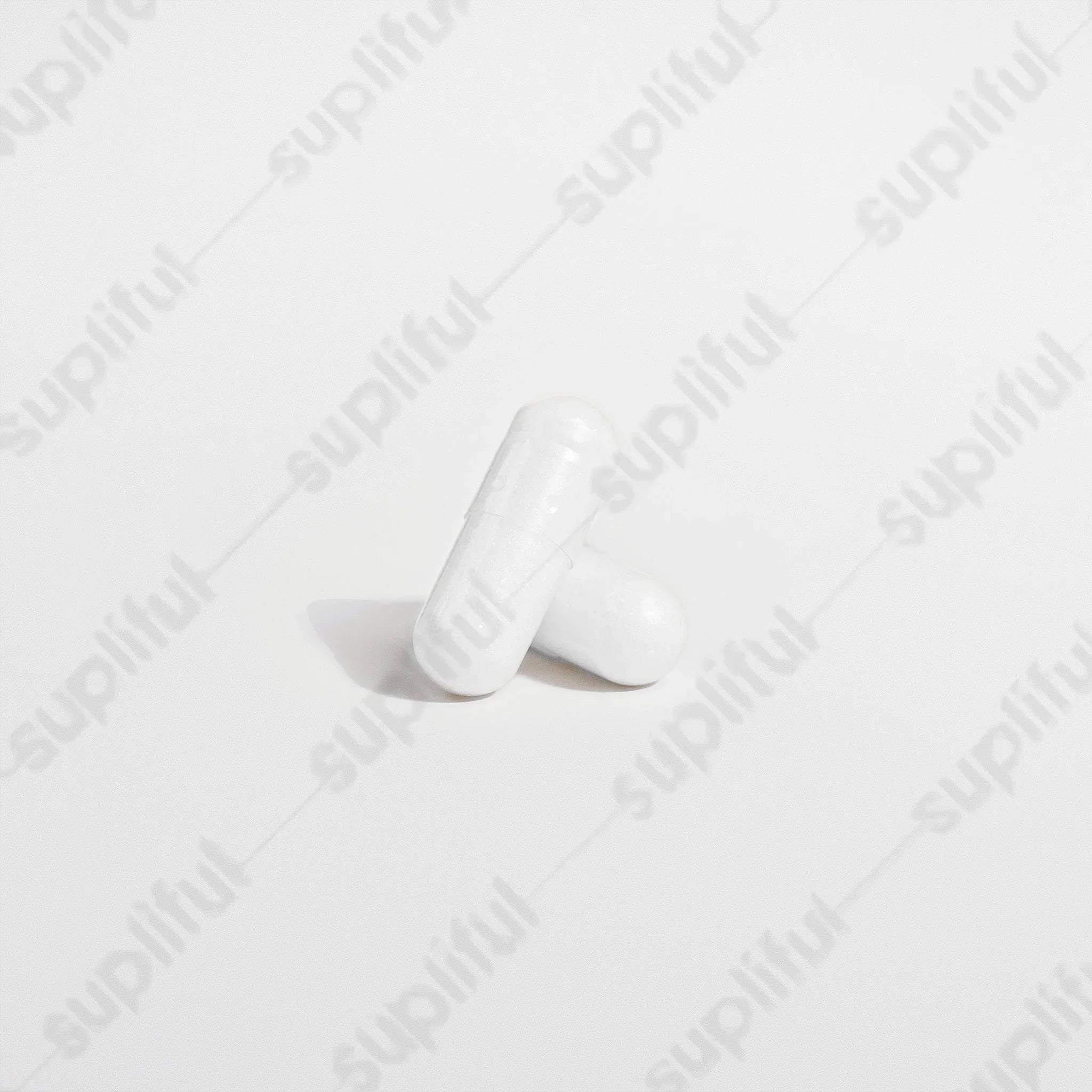 BlueHawk Supplements Magnesium Glycinate bottle with label showing supplement details and dosage information.
